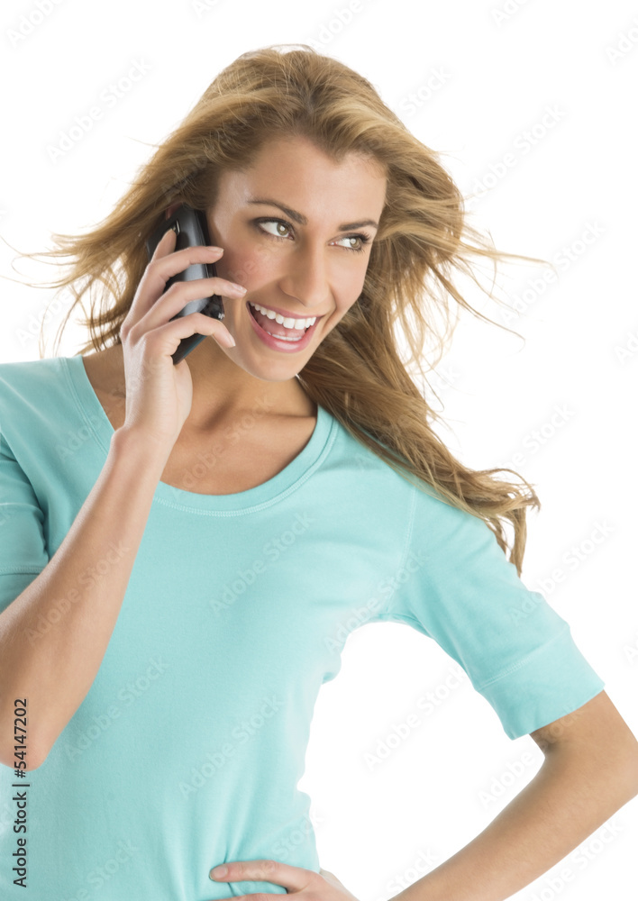 Happy Woman Looking Away While Using Smart Phone Happy Woman Looking Away While Using Smart Phone