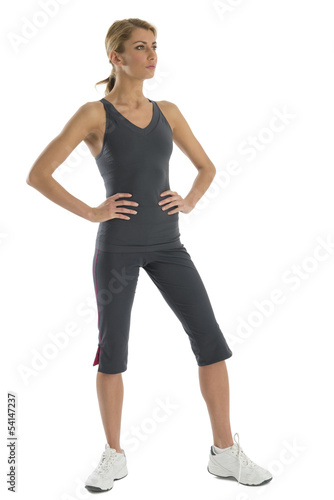 Fit Woman In Sports Clothing Looking Away
