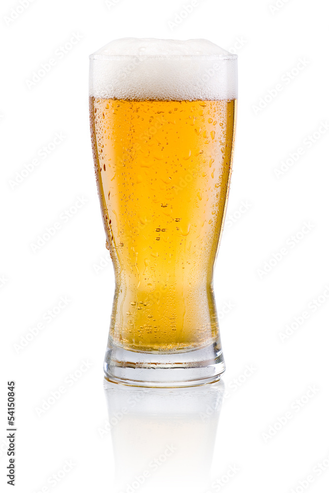Beer glass with condensation on a white background Beer glass with condensation on a white background
