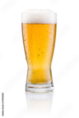 Beer glass with condensation on a white background