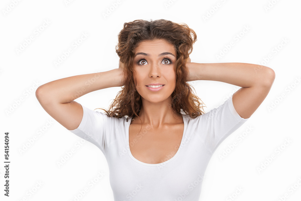 Fototapeta premium I can't hear anything. Beautiful young women standing with her