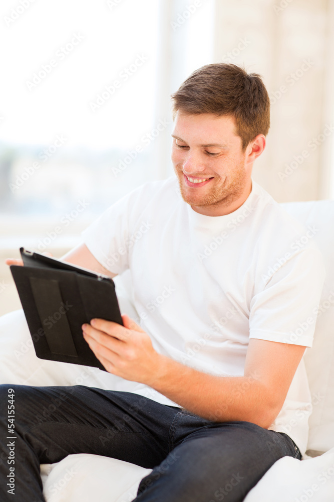 man working with tablet pc at home man working with tablet pc at home