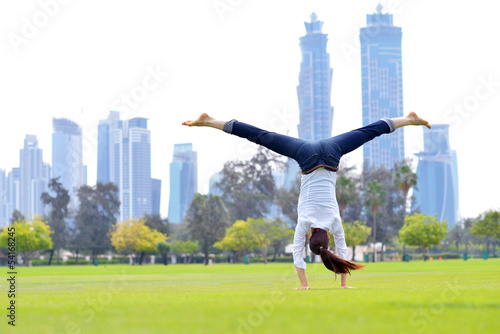 young woman jumping in park