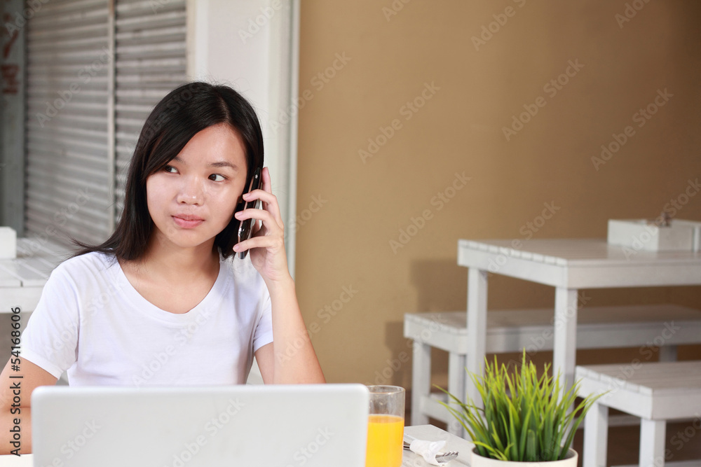 businesswoman talking on mobile phone businesswoman talking on mobile phone