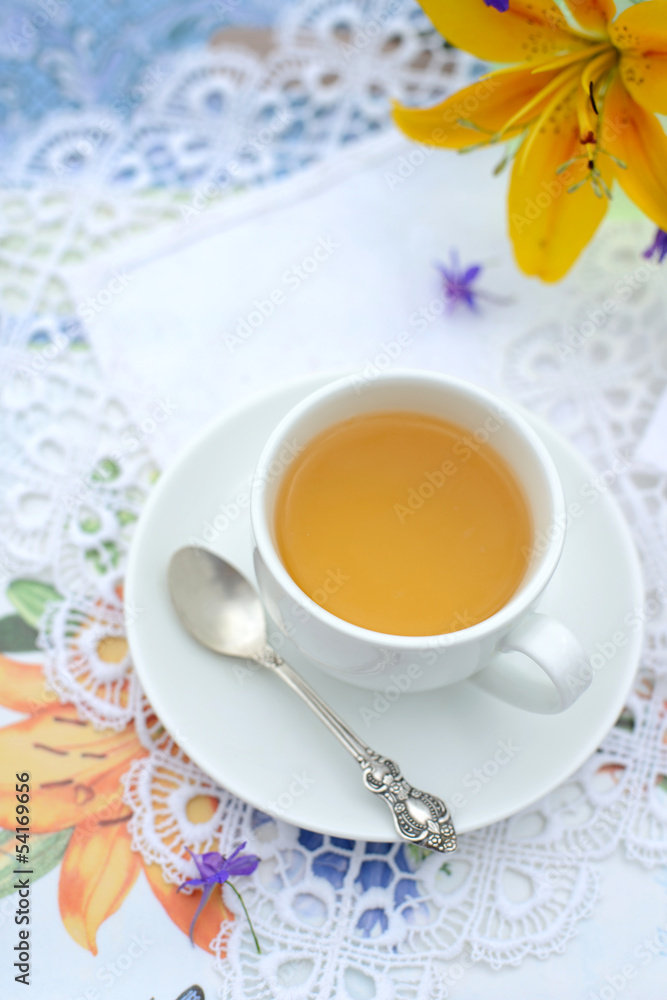 Сup of tea with a lily Сup of tea with a lily