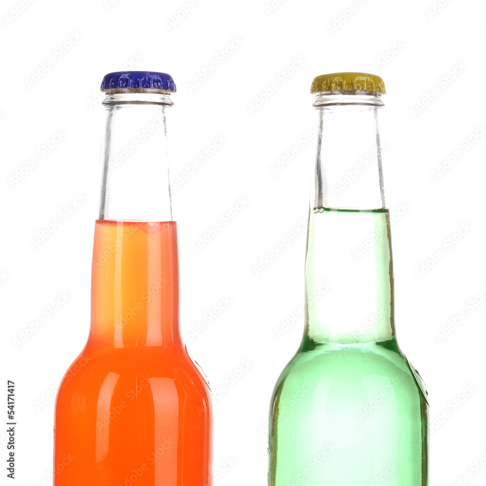 Tasty drinks in bottles isolated on white Tasty drinks in bottles isolated on white