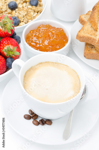 cup of cappuccino and breakfast  close-up selective focus