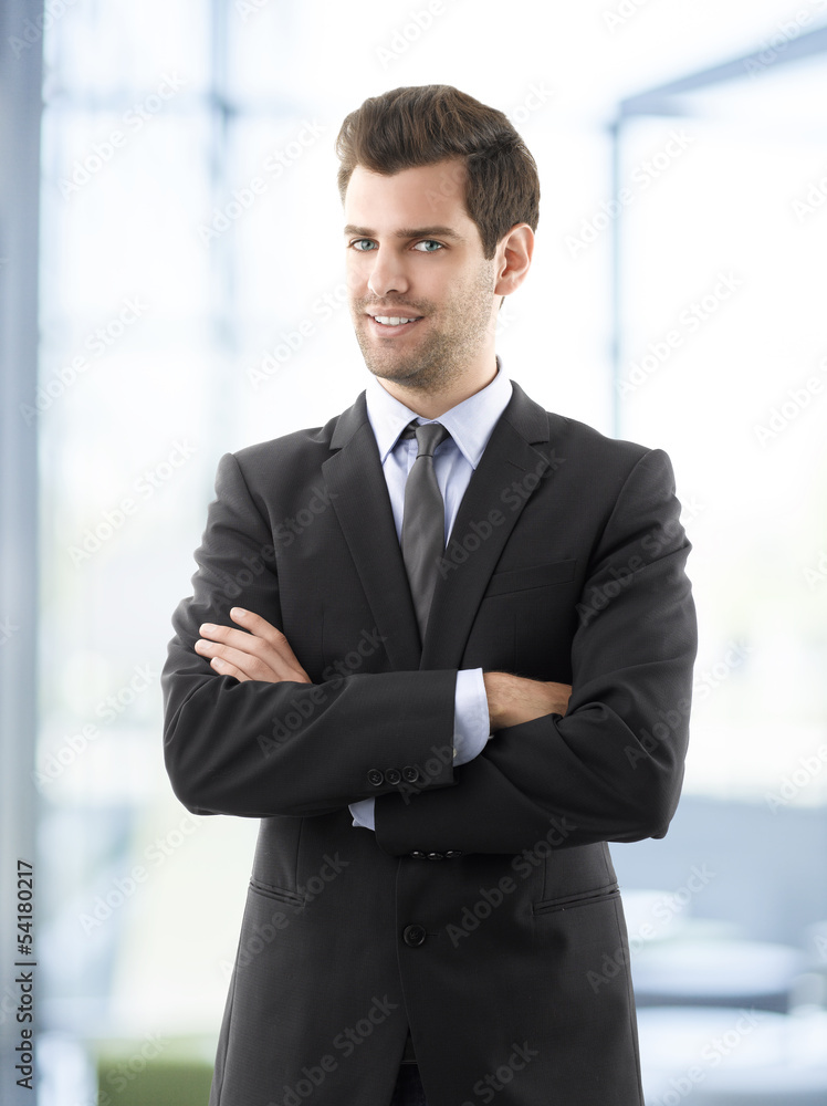 Portrait of professional smiling businessman Portrait of professional smiling businessman