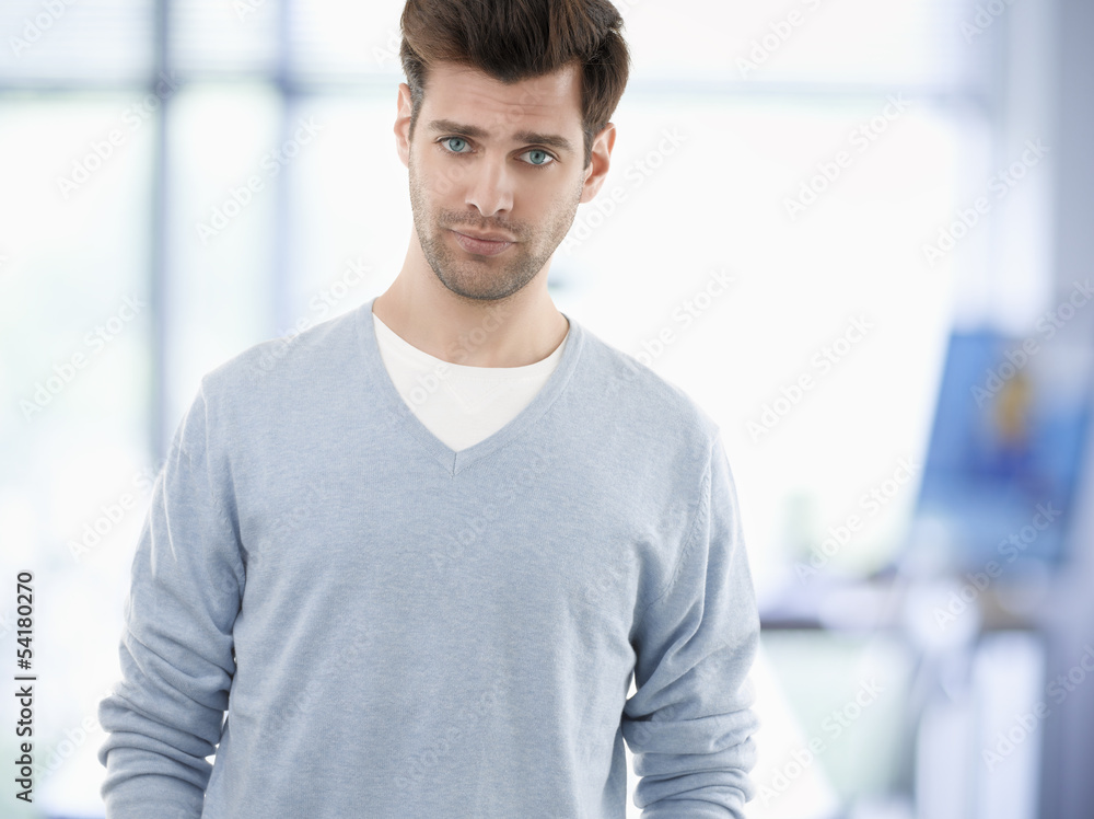 Smiling young businessman in casual Smiling young businessman in casual