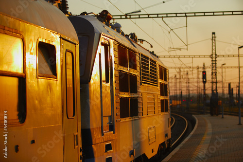 Canvas Print Train at the sunset