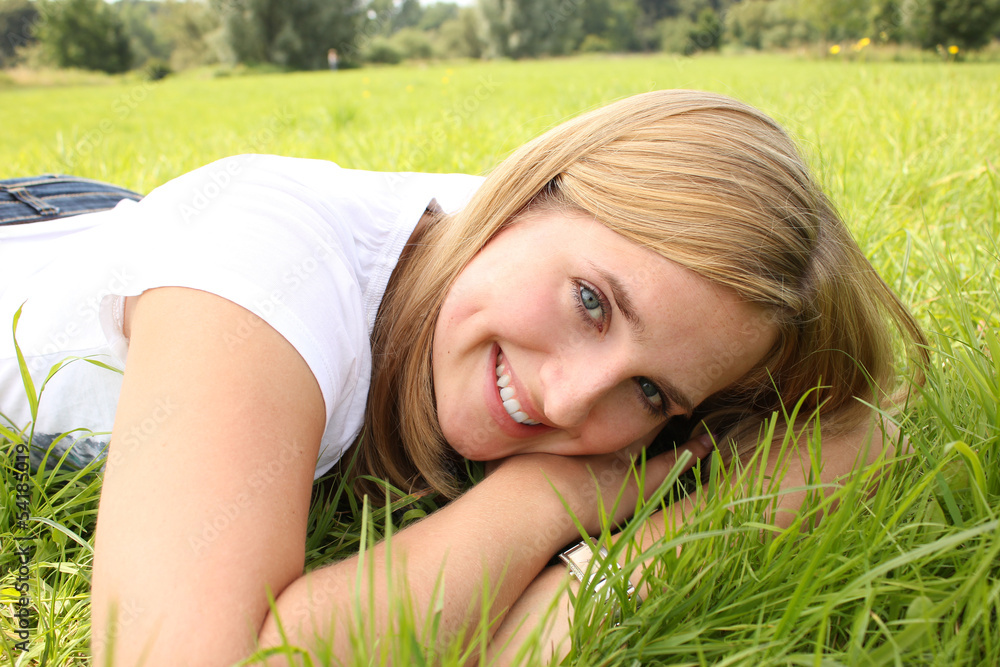 Girl Relaxing on Grass Girl Relaxing on Grass
