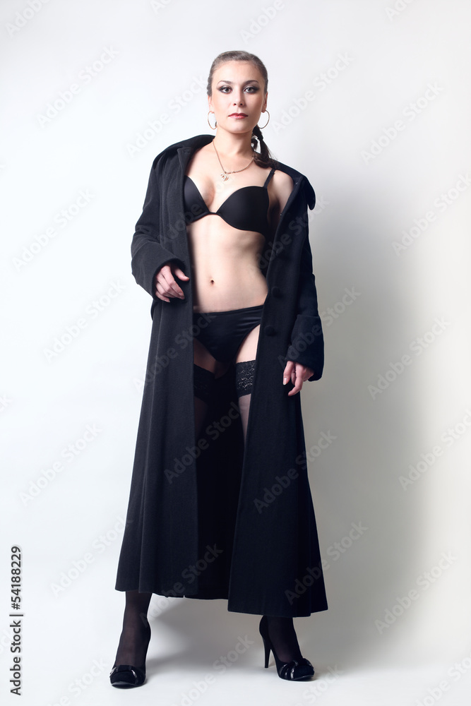 Sexy woman in black lingerie and coat Sexy woman in black lingerie and coat