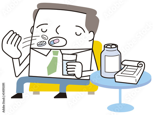 薬を飲むビジネスマン
