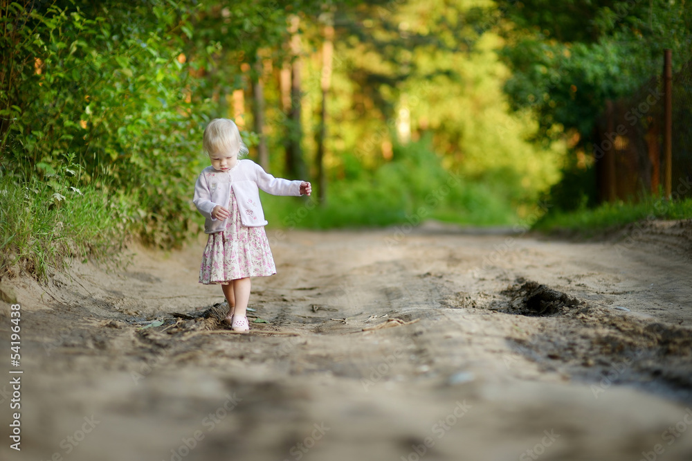 Little girl having a walk in the woods Little girl having a walk in the woods