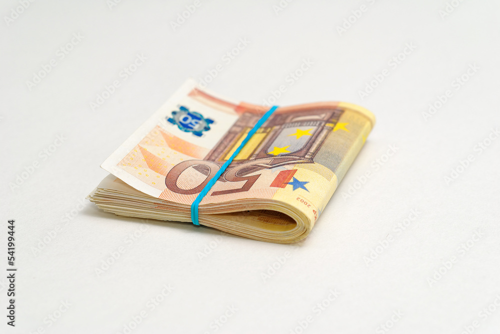 50 euro bills with rubber band isolated on a white background 50 euro bills with rubber band isolated on a white background