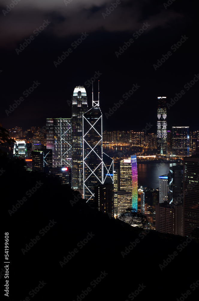 Obraz premium Elevated view of Hong Kong skyscrapers lit up at night