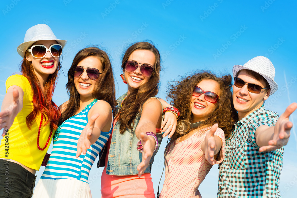 group of young people wearing sunglasses and hat group of young people wearing sunglasses and hat