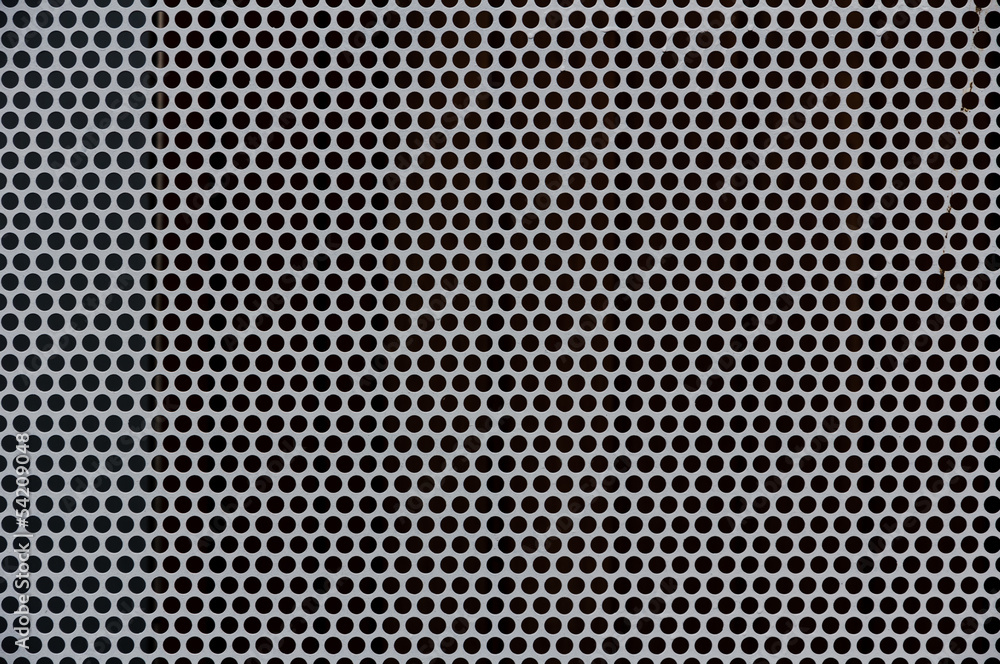 Background of gray metal with holes Background of gray metal with holes