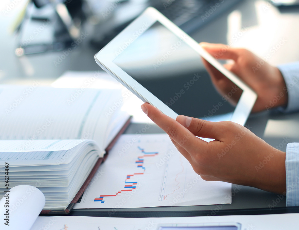 Businesswoman hands with touchpad Businesswoman hands with touchpad