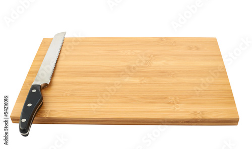 Steel kitchen knife on cutting board