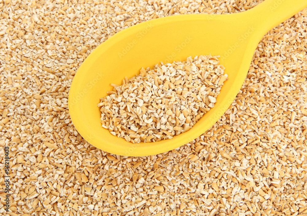 Yellow Spoon In Raw Oatmeal Yellow Spoon In Raw Oatmeal