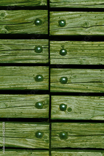 wood with rivets