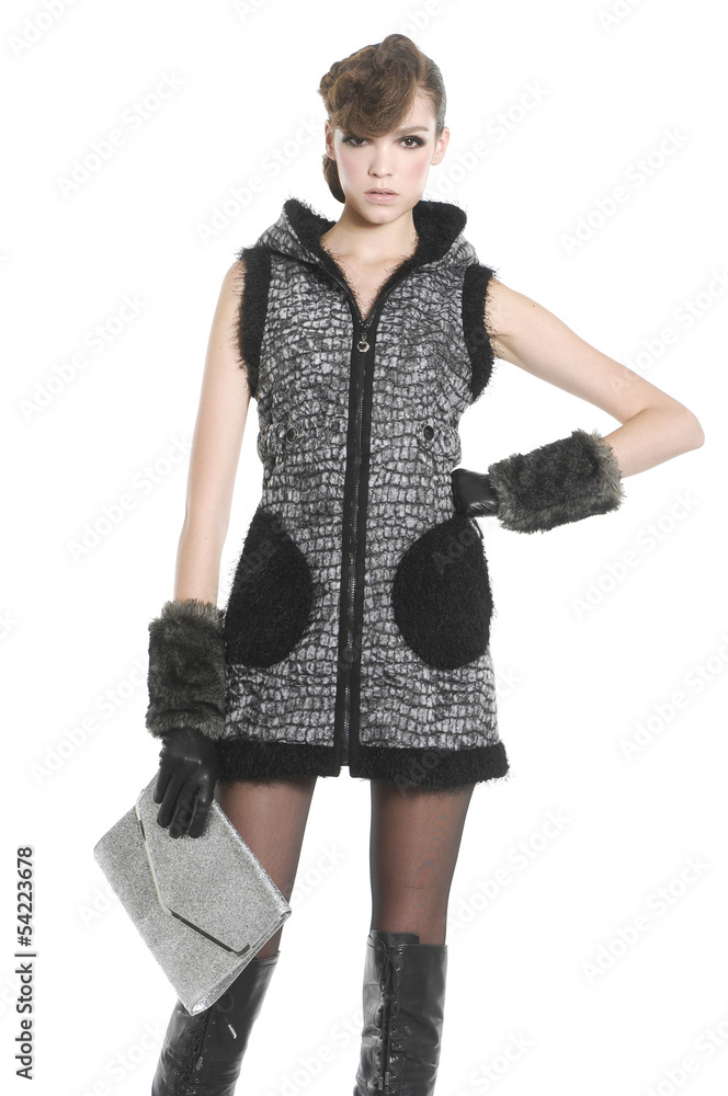 young fashion model in gloves with purse posing young fashion model in gloves with purse posing