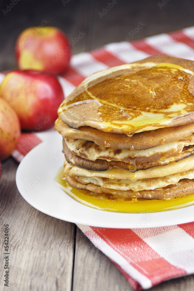 Pile of pancakes in the white plate Pile of pancakes in the white plate