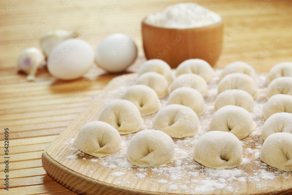 Meat dumplings on the kitchen board Meat dumplings on the kitchen board
