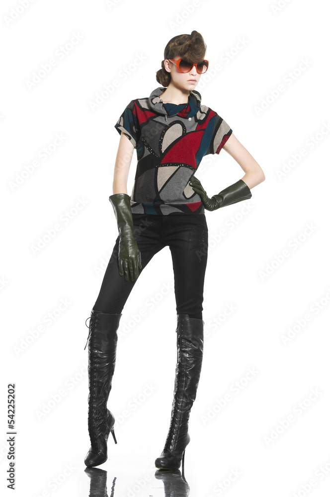fashion model in gloves with sunglasses posing in studio fashion model in gloves with sunglasses posing in studio