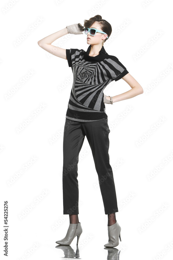 young fashion model in sunglasses with gloves posing young fashion model in sunglasses with gloves posing