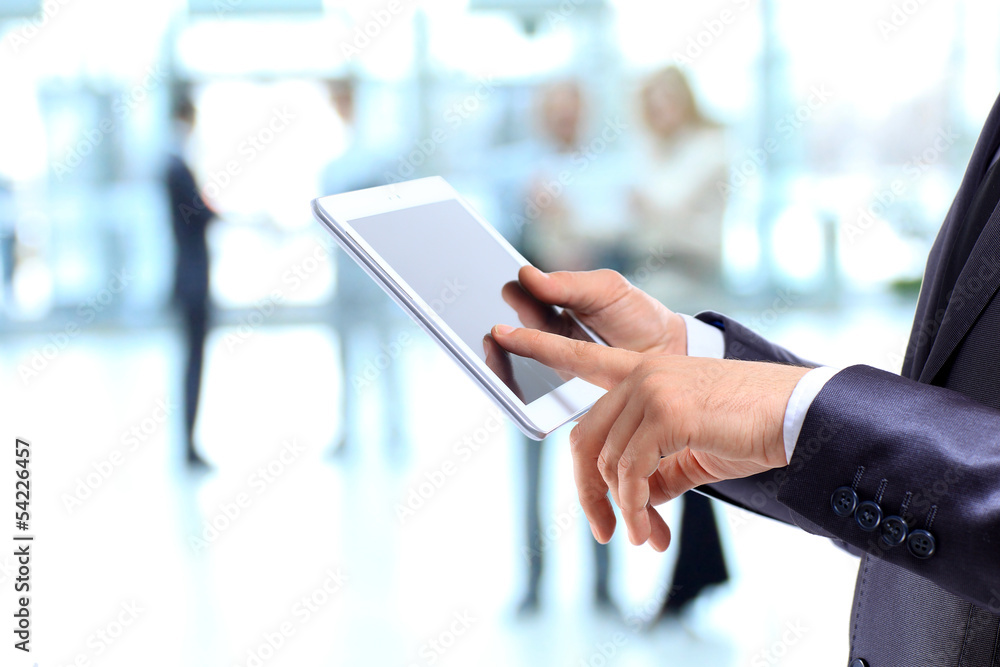 Businessman with the tablet. Businessman with the tablet.