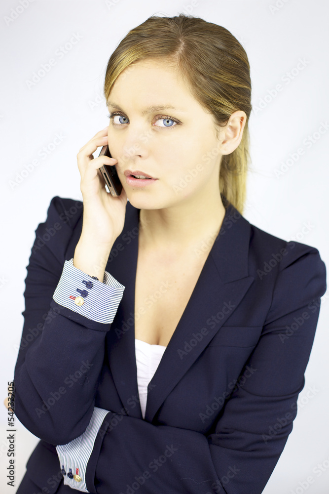 Beautiful blond business woman talking on the phone Beautiful blond business woman talking on the phone