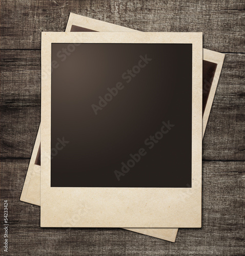 polaroid photo frames on wo...