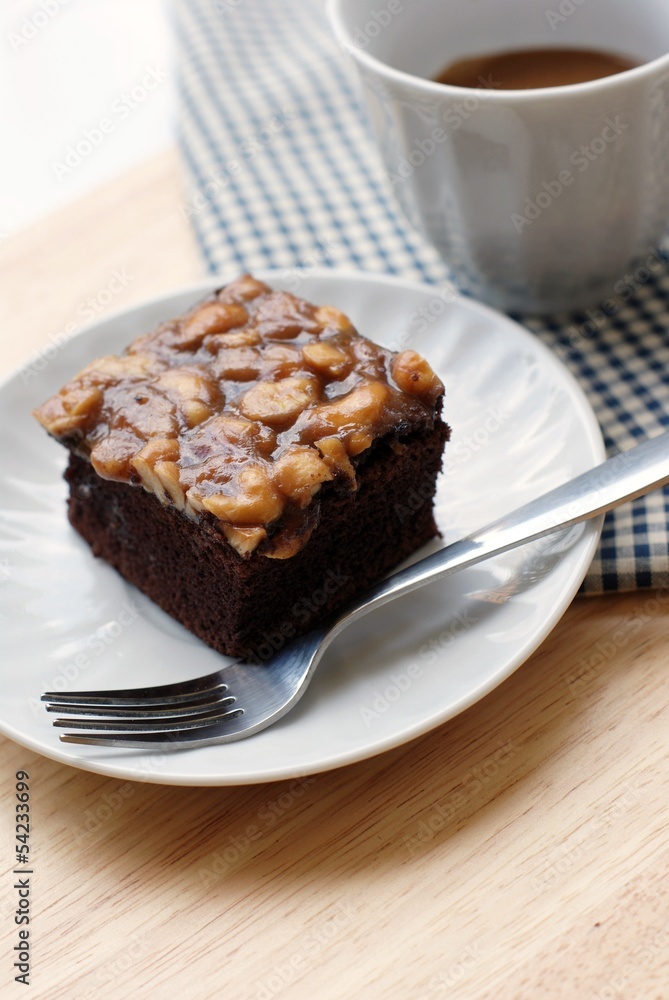 cake on white dish with coffee cake on white dish with coffee