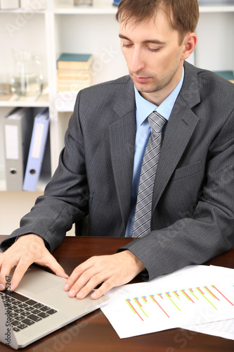 Young businessman in office...