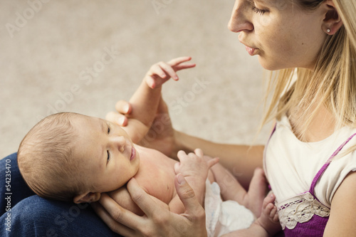 Принти на полотні Mother caring for small baby