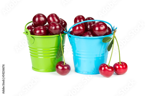 Two buckets with cherries