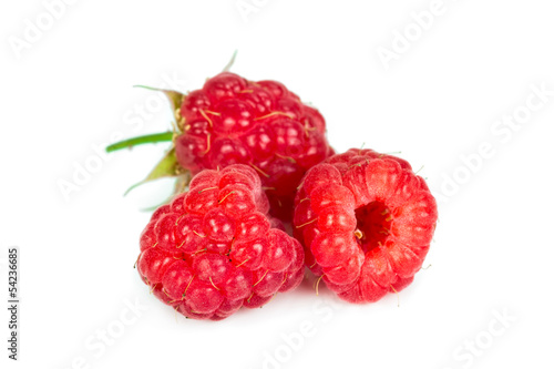 Three ripe Raspberries