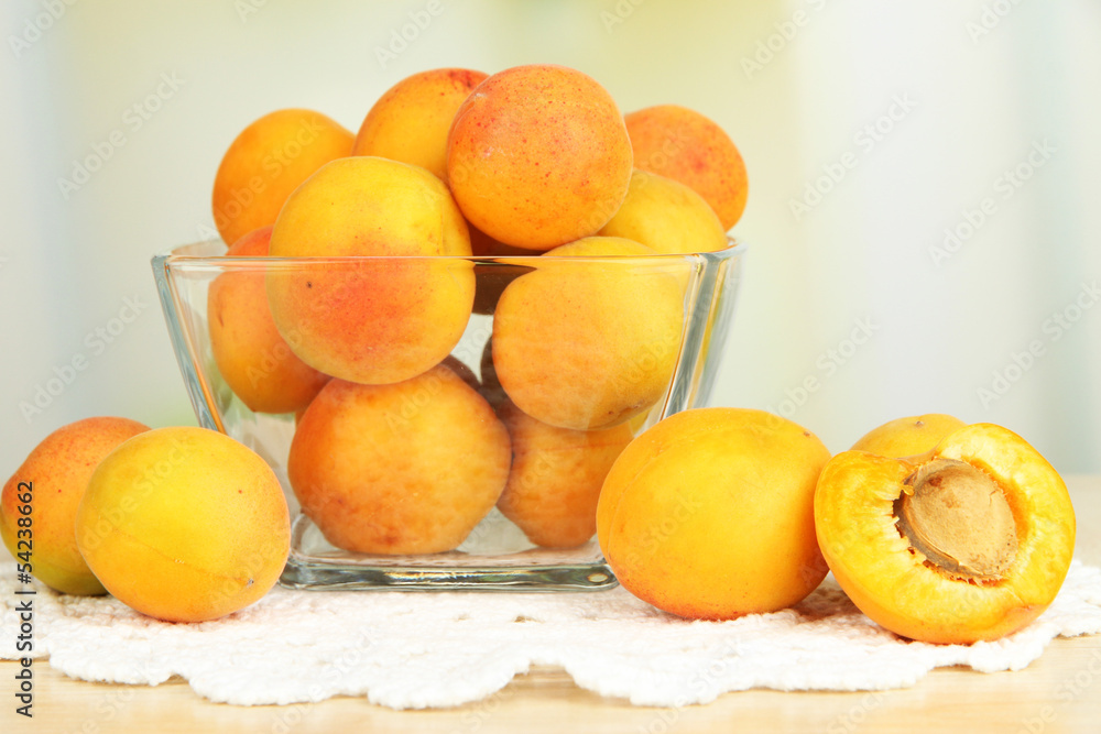 Fresh natural apricot in bowl on table in kitchen Fresh natural apricot in bowl on table in kitchen