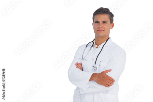Doctor smiling with arms crossed