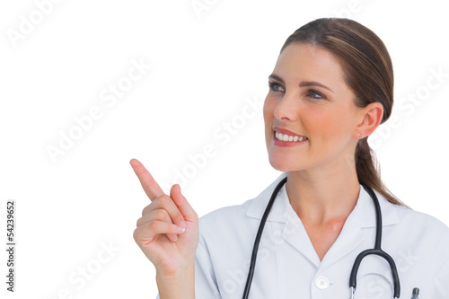Happy nurse pointing up