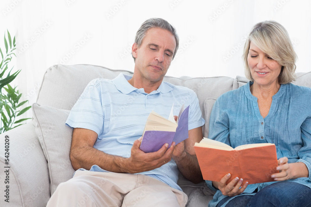 Couple talking about their books Couple talking about their books