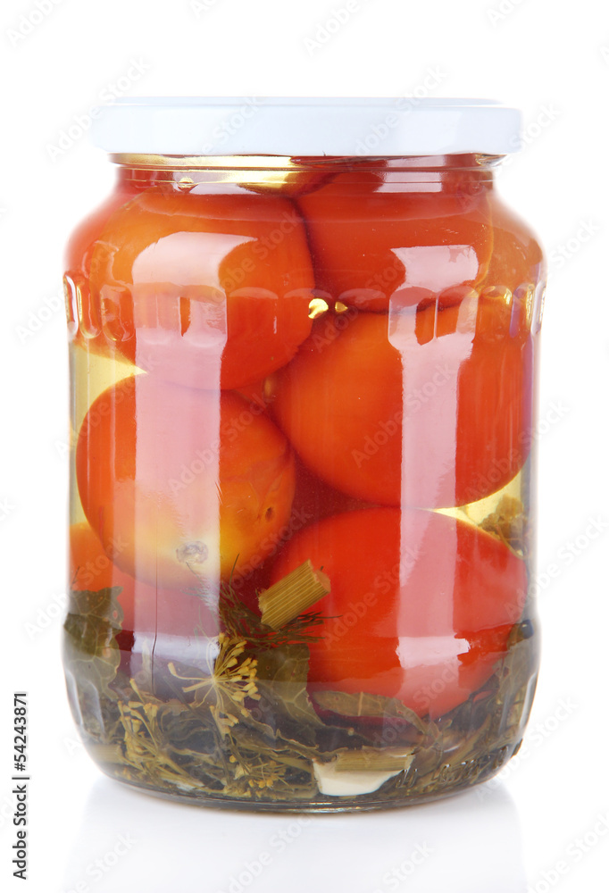 Tasty canned tomatoes in glass jar, isolated on white Tasty canned tomatoes in glass jar, isolated on white