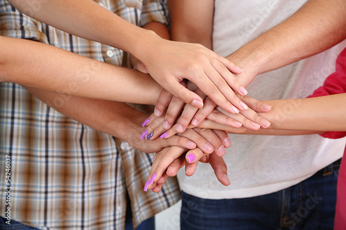Group of young people s hands  close up