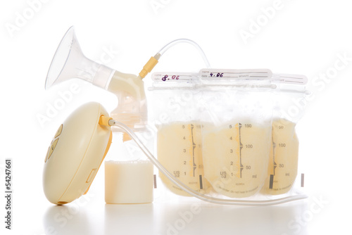 breast pump and bags of frozen breastmilk
