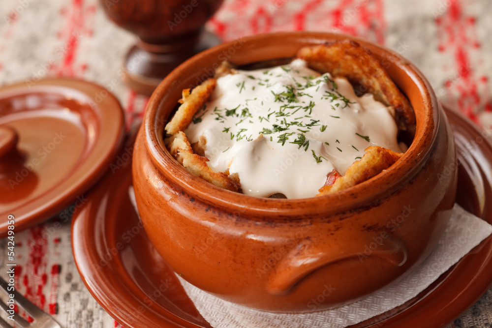 potato pancakes in the pot (national belorussian food) potato pancakes in the pot (national belorussian food)