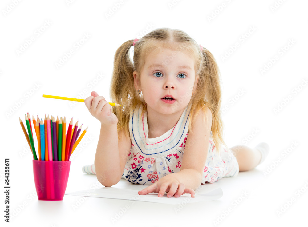 Cute girl drawing a picture with color pencils Cute girl drawing a picture with color pencils