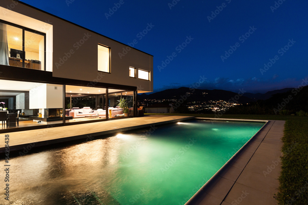 Fototapeta premium Modern villa, night scene,view from poolside