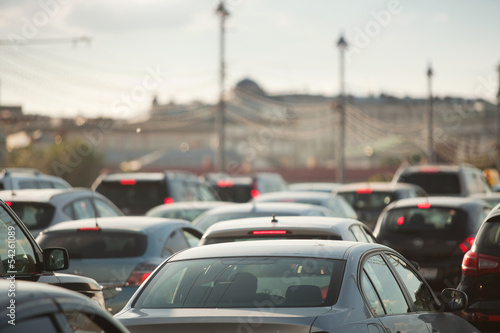 cars in traffic jam in a city during rush hour © Song_about_summer